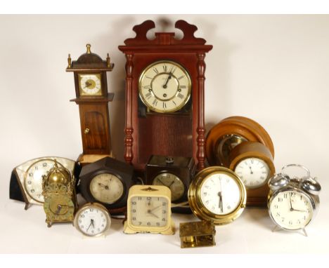 A collection of mid 20th century and later mantel clocks, having manual wind and quartz movements, in two boxes. (2) 
