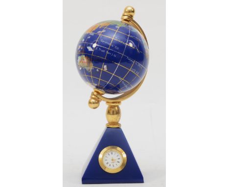 A 20th century multi gemstone set globe quartz clock, 18cm high 