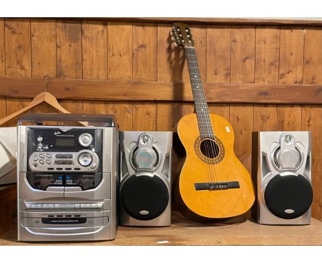 A Genius Hi-Fi system, comprising a turntable, radio, twin tape deck and CD player with a pair of speakers and a Encore acous