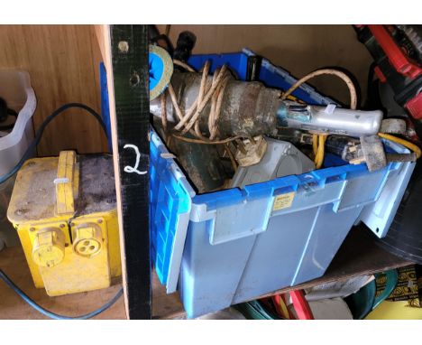 A group of 110V power tools to include a Makita 9609NB disk grinder, and a power bank. 
