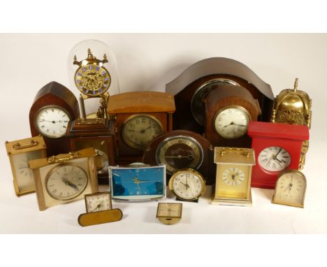 A collection of mid 20th century and later mantel clocks, having manual wind and quartz movements, in two boxes. (2) 