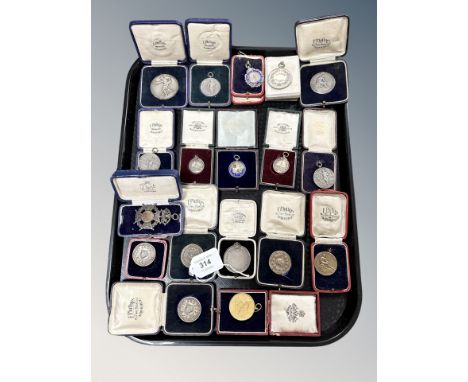 A collection of sporting medals and awards, some examples in silver and enamel, Aldershot Command Athletic association, Burma