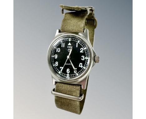 A copy of a CWC British Military issue quartz wristwatch, black dial with luminous hands, stamped to case back 0552/6644-86 a