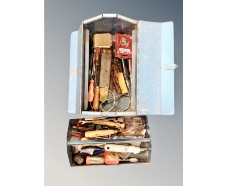 A concertina tool box and contents 
