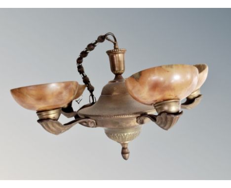 A Continental brass and marbled glass pendant light fitting 