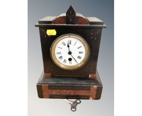A Victorian black slate and marble mantel clock 