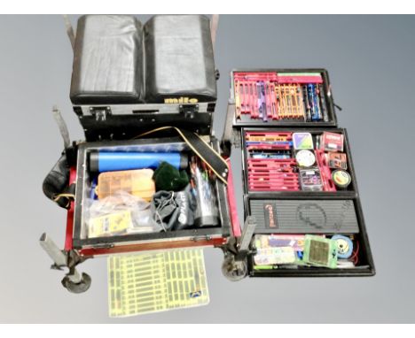 A Milo storage stool containing assorted fishing equipment 