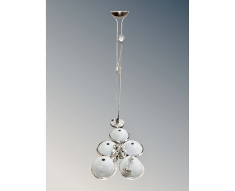 A contemporary uplighter together with six frosted glass pendant light fittings 