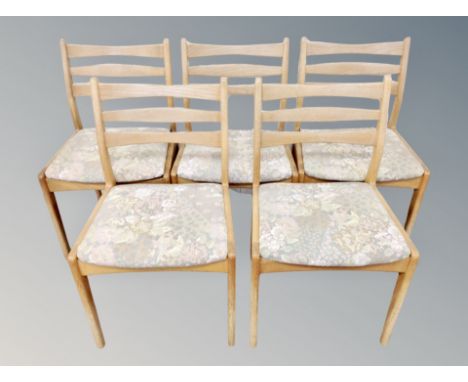 A set of five Danish blond oak ladder backed chairs 