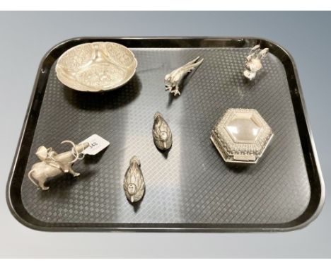 A two piece silver plated bird cruet, together with pheasant figure, metal Chinese ox figure, embossed dish and lidded pot.