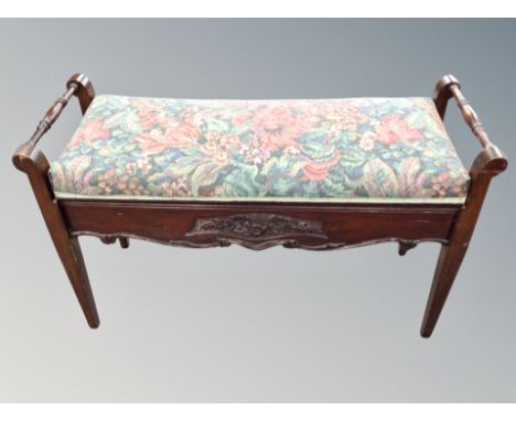 An Edwardian storage duet stool 