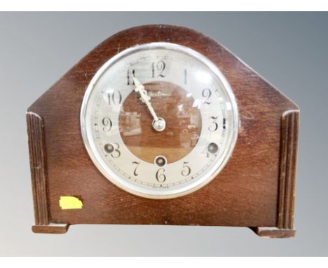 A Bentima eight day oak mantel clock 