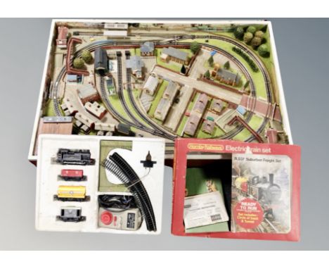 A Hornby Railways electric train set together with a model railway track 94 cm x 63 cm 
