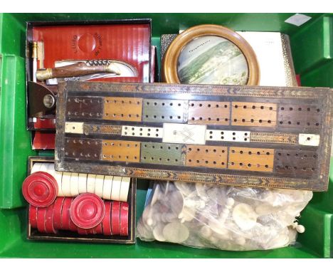 A late 19th/early 20th century hardwood and parquetry cribbage board with central Masonic square and compass, 30 x 11cm, vari