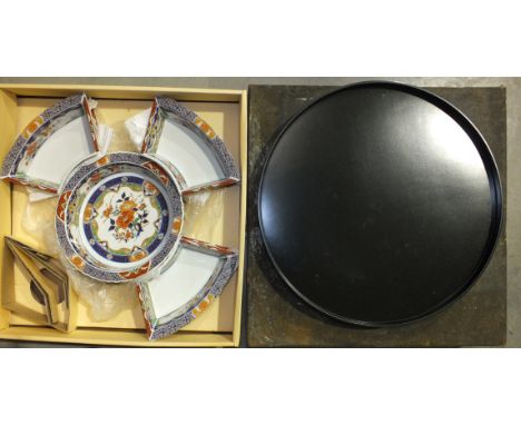 An Imari pattern ceramic set of hors d'oeuvres dishes set on plastic revolving tray, 44cm, in original box. 