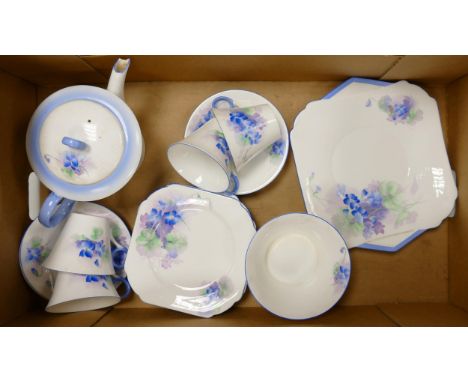 shelley china blue floral part teaset, comprising 4 cups and saucers, teapot (chip to spout) sugar bowl and cake plate. (19) 