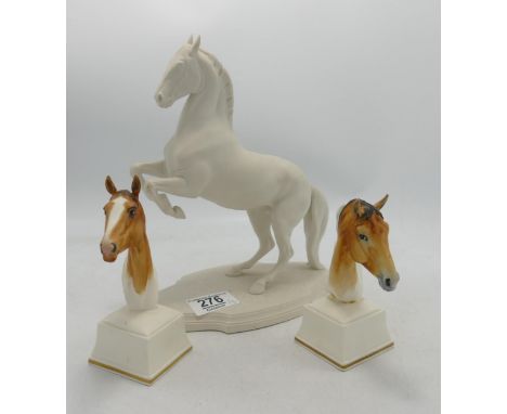 Royal Worcester Horse Busts Eous &amp; Aethon (damaged) together with bisque figure of rearing horse(3) 