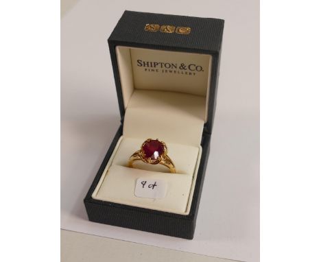 9ct gold hallmarked ring set large red stone , weight 4g, ring size R. 