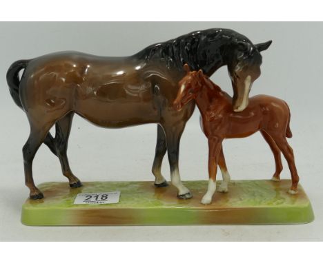 Beswick brown mare and chestnut foal on ceramic base 1811. 