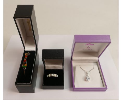 Three pretty sterling silver designer pieces of jewellery, including enamel bangle, opal style ring and white stone pendant &