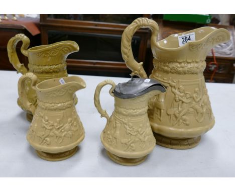 Ridgway Salt Glazed Graduated Set of Three Embossed Water Jugs with similar lidded item, tallest 26cm(4) 