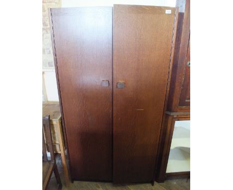 An Oak two door wardrobe 