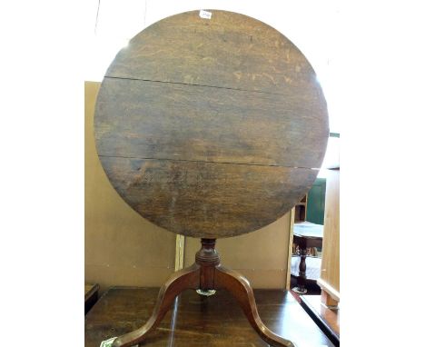 An Oak flap topped tripod table