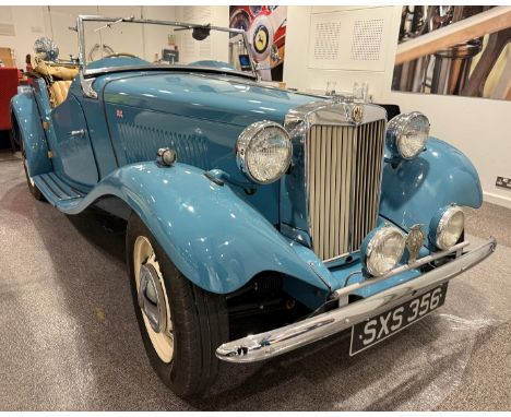 1951 MG TDRegistration number SXS 356Clipper blue with a mushroom interiorThe owner informs us the car was not a body off res