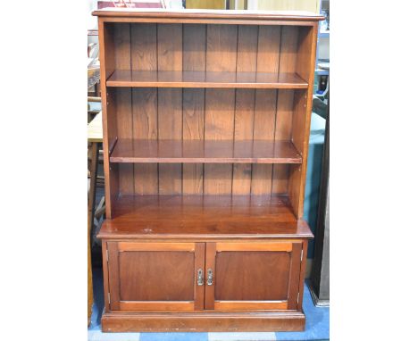 A Modern Mahogany Two Shelf Bookcase with Cupboard Base, 92cm wide 