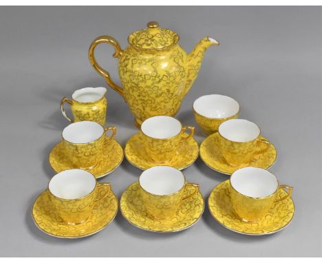 An English Bone China Laurie &amp; Co. Coffee Set for Six Decorated with Gilt Foliage on Yellow Ground to Comprise Coffee Pot