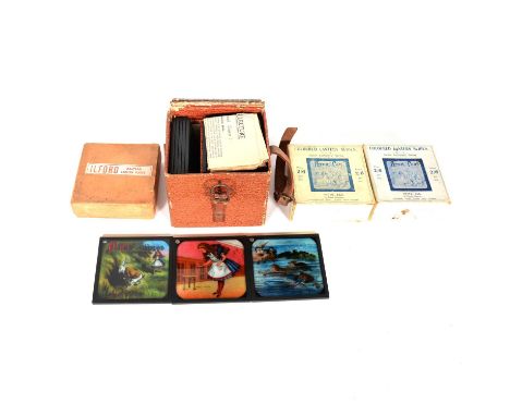 A collection of coloured magic lantern slides, Alice in Wonderland, twenty-four slides in a fitted case; two boxes of Peter P