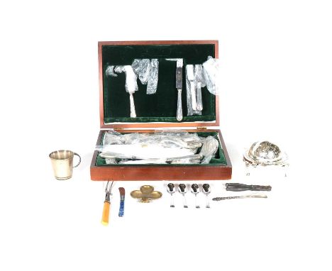 A canteen of silver-plated bead edge cutlery, another oak canteen and loose flatware and condiments; corkscrews and nutcracke