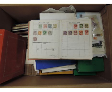 A large box containing World stamp collection, loose and in albums