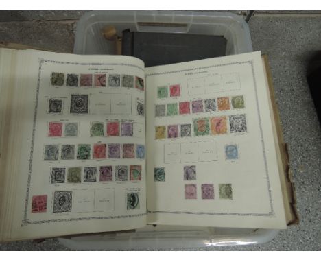 A box containing world stamp albums, two very fine old GB British empire and world albums