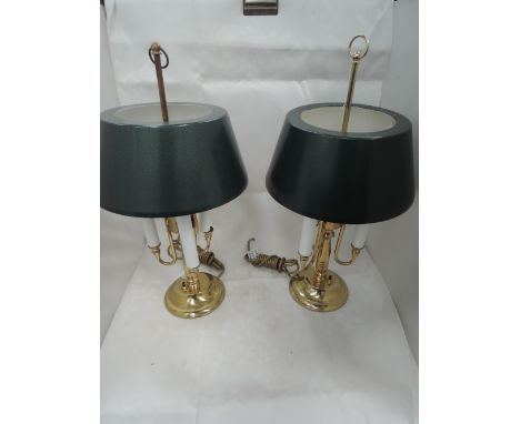 A pair of modern brassed table lamps of candelabra design and a brass candlestick lamp