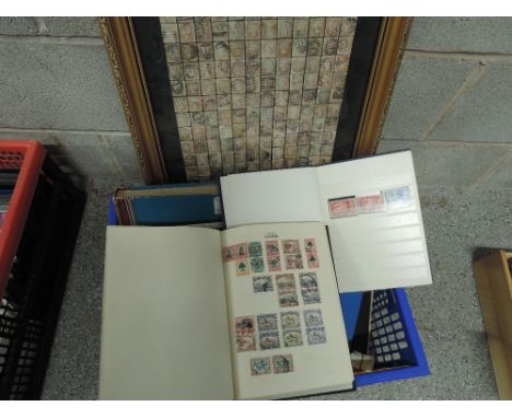 A large box of world stamp albums and a penny red display