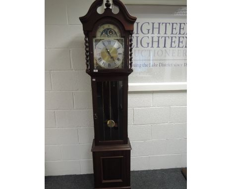 A late 20th century Emperor mahogany longcase clock having swan neck hood with moon phase dial and chiming movement on glass 