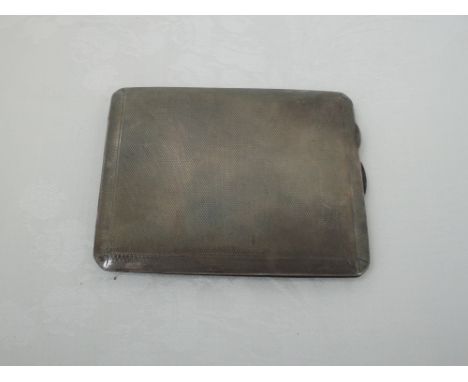 A silver cigarette case having engine turned decoration, Chester 1933, E J Trevitt & Sons,  approx 107.1g