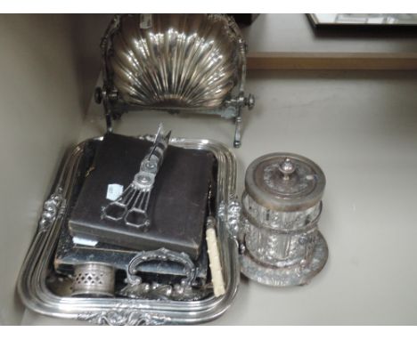 A selection of silver plated items including covered serving dish, candle wick scissors, preserve pot, cased flatware and a S