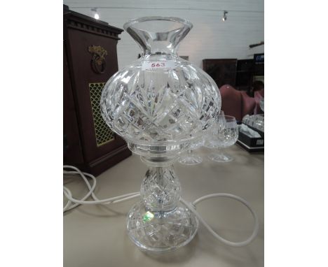 An Irish glass table lamp having funnel and globe top