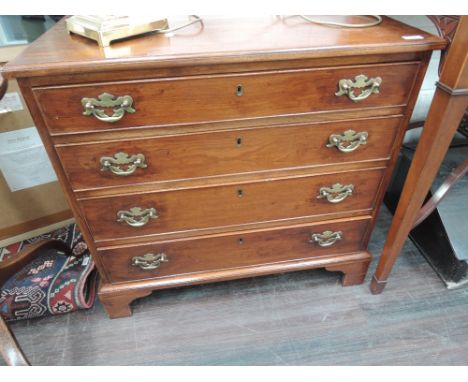 A 19th mahogany chest of four graduated cockbeaded drawers on bracket feet