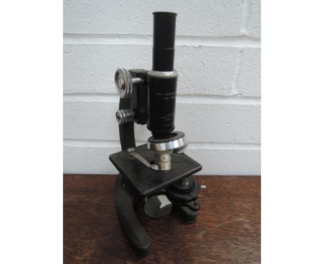 A vintage microscope by Cooke, Troughton &amp; Simms Ltd, York , in fitted box, labelled BCZD 77