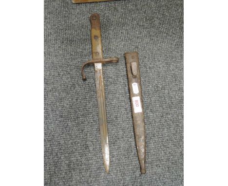 A WW11 bayonet with scabbard, rusty