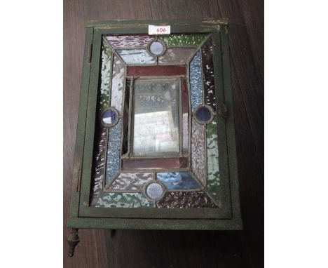 An early 20th century metal frame vestibule lamp shade having coloured and bevelled glass panels