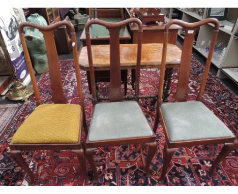 Three 1920's mahogany Queen Anne style dining chairs having ring detail and two dark mahogany Queen Anne style dining chairs