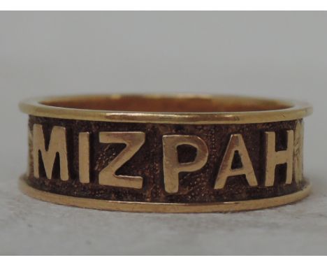 An 18ct gold MIZPAH  band ring, approx 4.8g