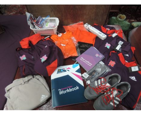 A collection of London 2012 Olympic & Paralympic volunteers uniforms designed by Stella McCartney. Including official Adidas 