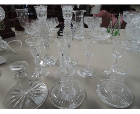 Four pairs of Irish glass candlesticks, including Waterford and a single candlestick