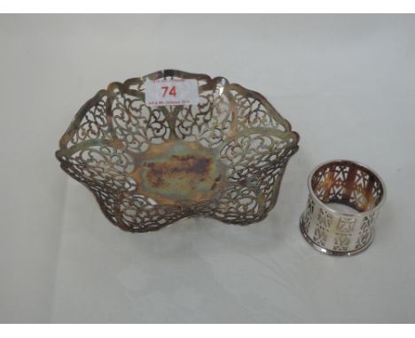 A silver trinket dish of hexagonal form having pierced decoration on trefoil bun feet, Birmingham 1959, Lancelot & Hall Ltd, 