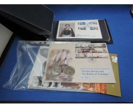 A album of first day covers and coin covers